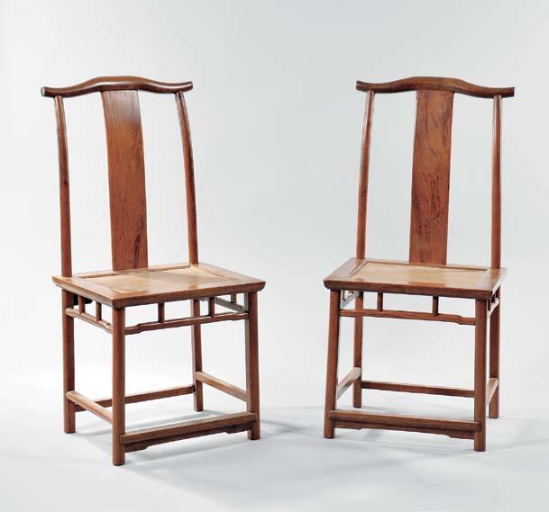 530 530 Pair of Elmwood Yoke-back Chairs, China, late 19th/20th century, round posts with curved back splat and yoke-shaped crest rail, with a framed woven seat panel, ht. 42 3/8, wd. 19 1/2, dp.