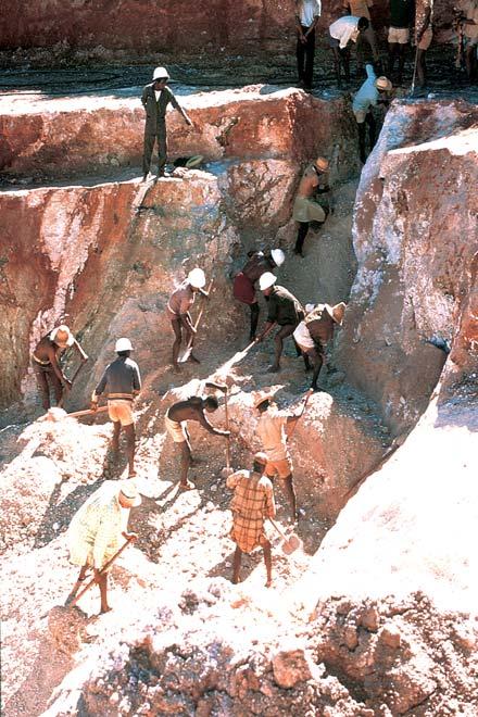 Figure 6. Miners excavate one of the pegmatites at the Anjanabonoina deposit for Société Germadco in 1975. Photo by Eckehard Petsch.