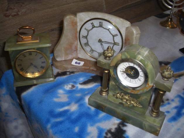 Two Onyx clocks, 1 carriage and 1