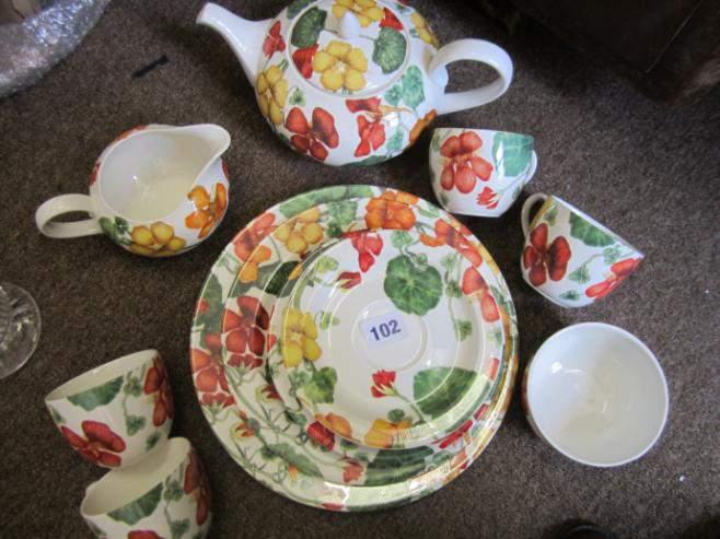 Poole Pottery "Nasturtium" tea set comprising teapot, milk jug,