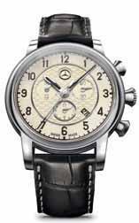 WATCHES & CLOCKS 1 2 1 UNISEX BUSINESS CHRONOGRAPH WATCH Silver-coloured stainless steel case. Black dial. Numerals and hands with luminous detail. Date feature. Rotating bezel.