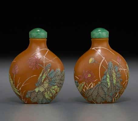 6020 A RARE ENAMELED CARAMEL GLASS Guyue Xuan mark, 1770-1799 Of spade form with a waisted neck, slightly concave lip, painted in thin enamels of varied and subdued shades around the sides to present