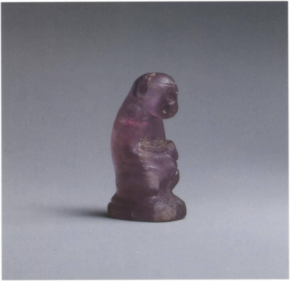 EGYPTIAN I989.281.90 I989.281.9I * Monkey Holding Her Baby Amethyst Height i3/8 in. (3.5 cm) Egyptian, Dynasty i2, ca. 1991-1783 B.C. Gift of Norbert Schimmel Trust, 1989 1989.281.90 Beauty I964, no.