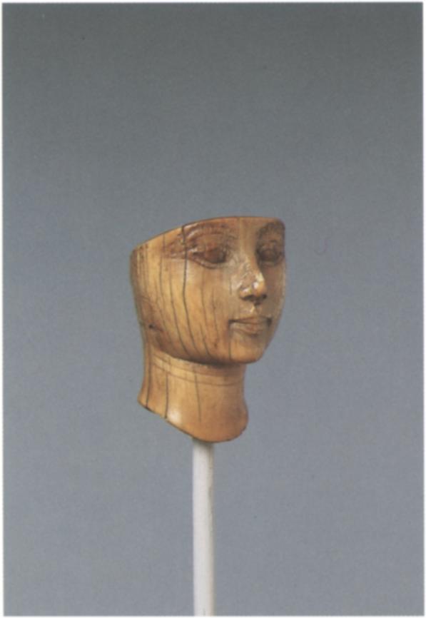 1 Head of a Woman Hippopotamus ivory, traces of Egyptian blue Height i I/8 in. (2.7 cm) Egyptian, late Dynasty i8, reign of Amenhotep in, ca. I39I-I353 B.C. Gift of Norbert Schimmel Trust, I989 I989.