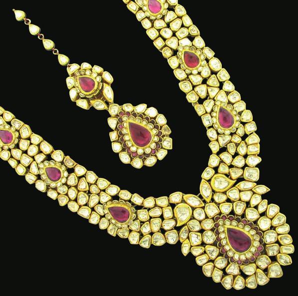 The contemporary neckwear uses uncut diamonds, and is complemented with black enamel work.