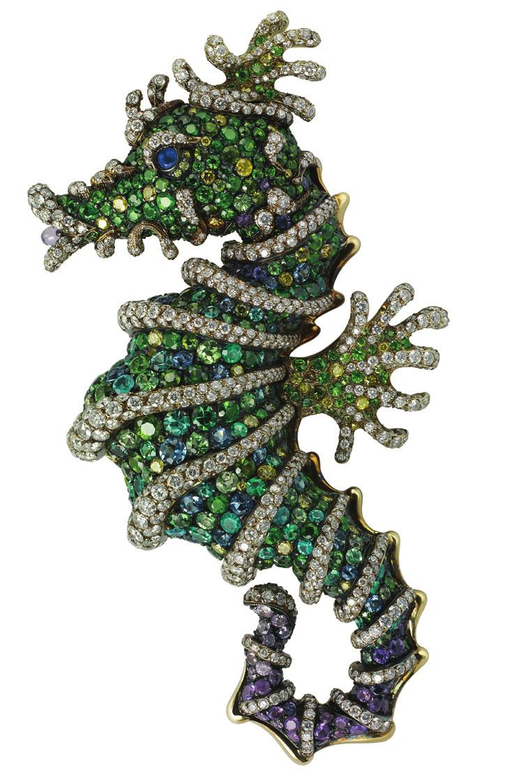 The three-dimensional Firebird Brooch, the magical bird of paradise of Russian fairytales, captures the vibrancy of the creature, and is encrusted with more than 100 coloured diamonds, in yellow,