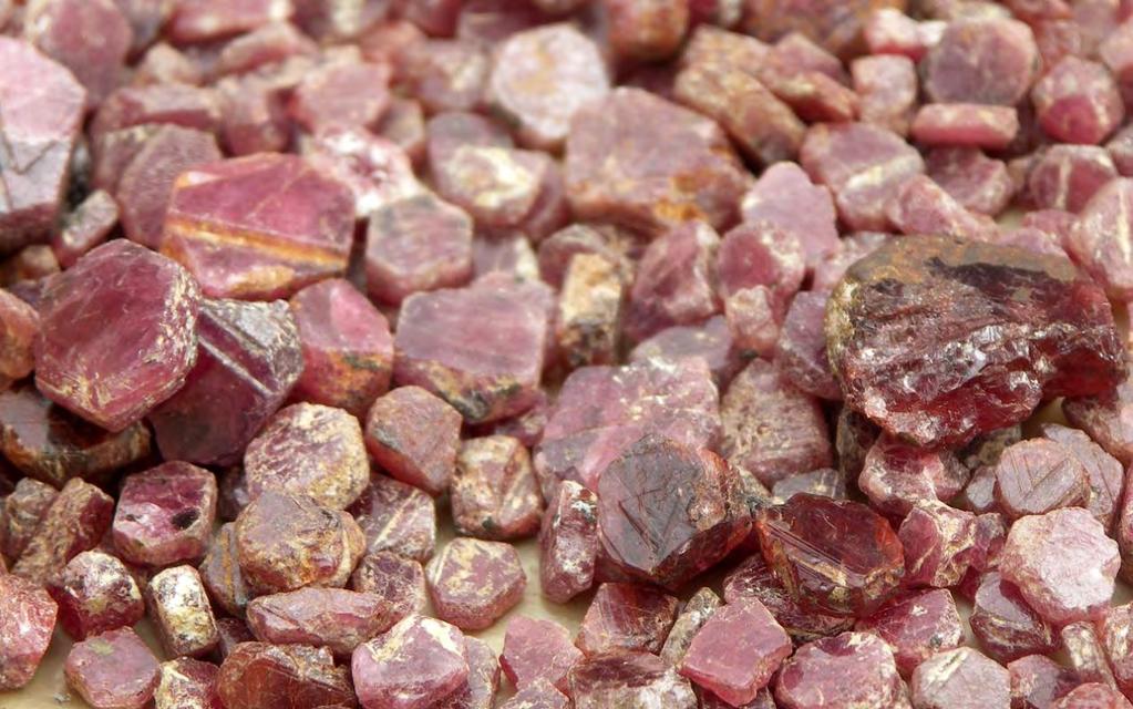 Figure 13: Low quality rubies seen in Andilamena in July 2005. This material is heavily fractured and thus the light does not go through the stone.