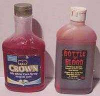 You can buy large volumes of pre made blood, however it can become a little expensive. A great recipe I use is to buy a plastic squeeze bottle of White Corn Syrup.