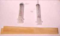 You can get some plastic syringes (no needles) from a pharmacist or a vet.