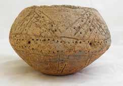 Kirkoswald Old Parks from Cumbria, found containing 12 cannel coal beads and highly decorated Southern Black Howe, a little plain unperforated cup from the North York Moors The Cowlam Cup from the