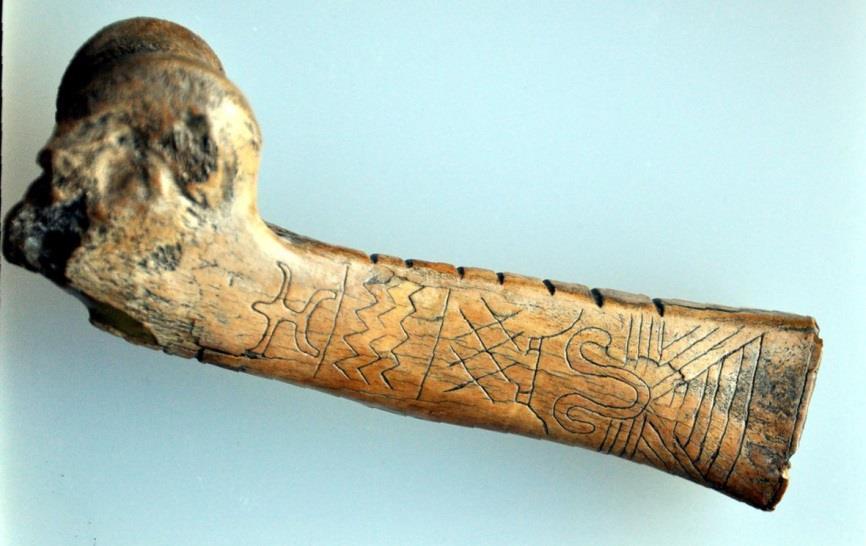 Image: Bone engraved with geometric motifs and