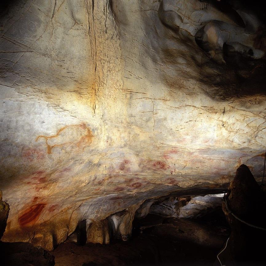 Image: Cave art, including bison and handprints Location: Cueva del Castillo, Spain Date: