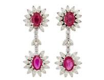 22 PAIR OF 14K WHITE GOLD STUD EARRINGS each set with a brilliant diamond (2.02ct & 2.08ct.), 2.7 grams $13,000 16,000 23 PLATINUM RING set with an oval cut rubellite (2.78ct.