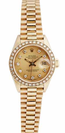 52 Lyon & Turnbull 89 A lady s 18ct gold and diamond set wrist watch, Rolex Oyster Perpetual Datejust, ref.