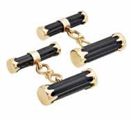 Boucheron Paris and numbered 30589 Length: 27mm 1,500-2,000 94 A pair of onyx cufflinks, Tiffany & Co.