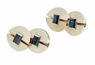 (at widest) 800-1,200 104 A pair of sapphire set cufflinks each terminating in two circular buttons with belcher link connector, the centre of each end