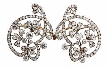 30cts 5,000-7,000 2 A late 19th century diamond set double-clip brooch formed as symmetrical sprays of clover within scrolls, set with round brilliant