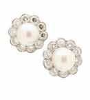 00cts 9,000-11,000 3 A pair of pearl and diamond set cluster earrings, possibly Cartier each set with a central pearl in a border of old round cut