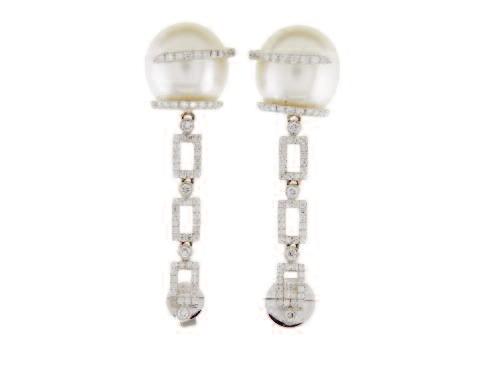 Fine Jewellery Auction - Tuesday 29 November 2016 at 7 p.m. 84 PAIR OF 18K WHITE GOLD DROP EARRINGS each set with 52 small brilliant cut diamonds and suspending a South Sea pearl (13.2mm), 14.