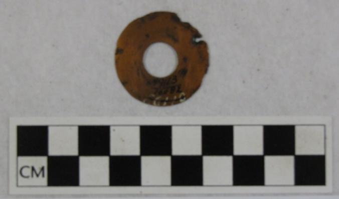 Figure 9. Disk-shaped ornament from Mound 25 Copper Deposit (MPM Cat. #49113, used with permission of the Milwaukee Public Museum) Liverpool, Hannah, and Gibson.