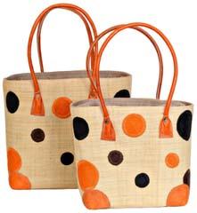 eye-catching raffia shoppers with our unique bold appliqué design on the front and reverse.