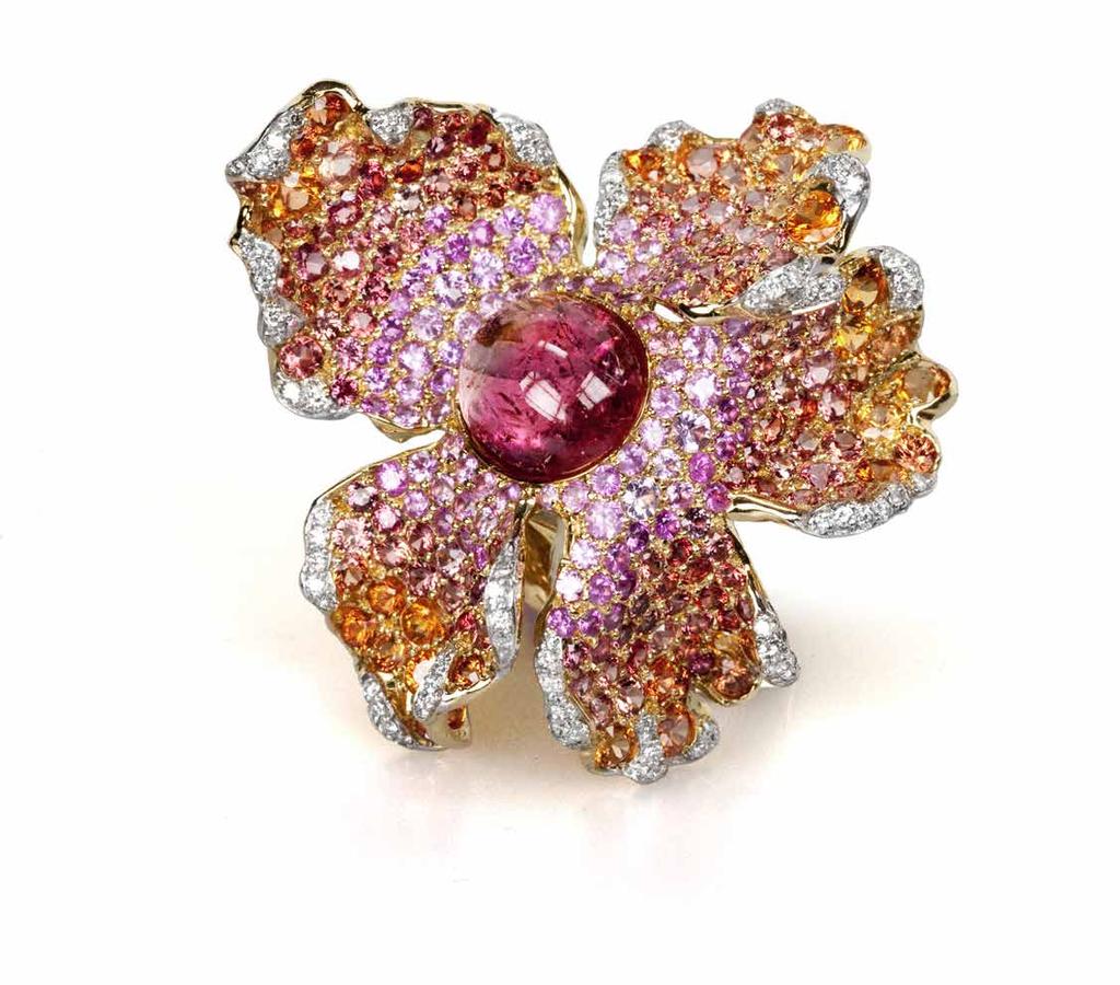 www.andremarcha.com Orchid Ring in 18K yellow gold set with one pink tourmaline cabochon, orange and pink sapphires, and white diamonds. POA.