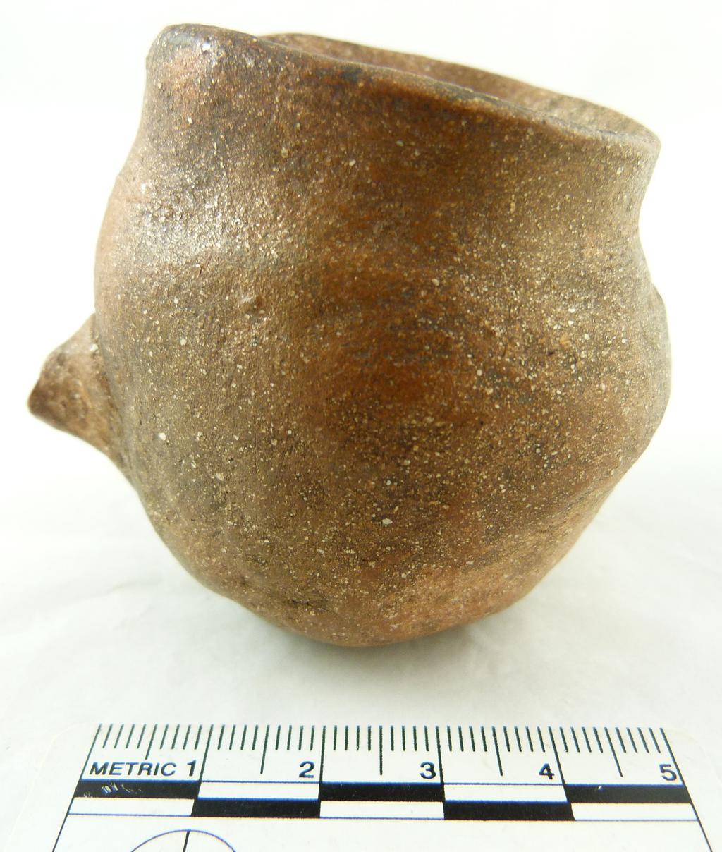Figure 5. A miniature cup dated c 500, of Saxon form but made with Romano-British potting techniques, from Gaping Lane, Hitchin (Hertfordshire).