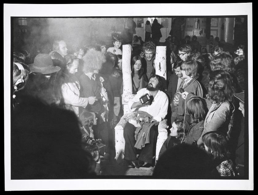 Harald Szeemann (seated) on the last night of documenta 5: Questioning Reality Image Worlds Today at Museum Fridericianum, 1972. The Getty Research Institute, 2011.M.30.