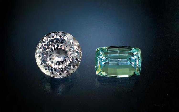 Figure 1. Both the 23 ct aquamarine and the 43 ct silver topaz were faceted from material found at Klein Spitzkoppe. Courtesy of Martha Rossouw; photo Bruce Cairncross.