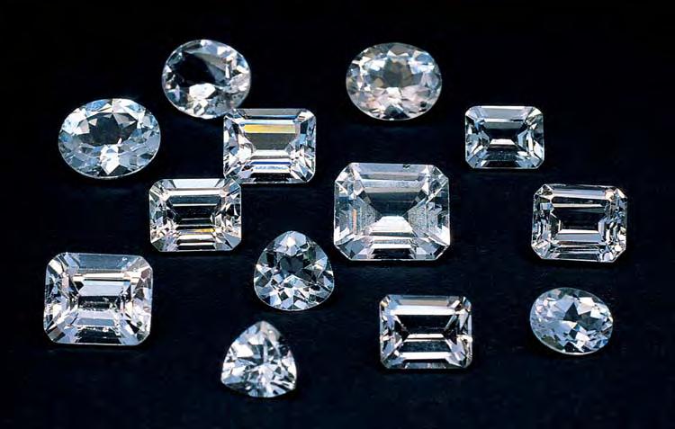 Figure 7. Faceted, colorless topaz from Klein Spitzkoppe is commonly marketed as silver topaz.the emerald-cut stone in the left foreground is 1.4 cm long, and the stones average about 5 6 ct.