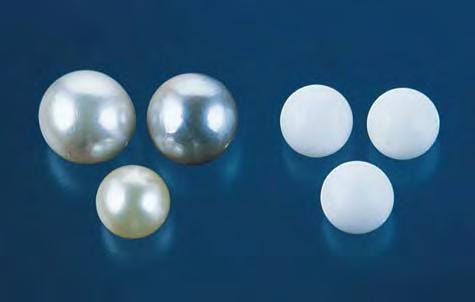 Figure 8. The pearls on the left, which range from 10.75 10.30 mm to 7.90 7.35 mm, were cultured on white dolomite beads similar to the ones shown on the right. Figure 9.