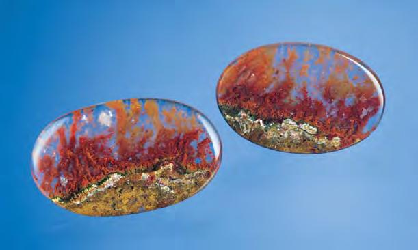 Figure 3. These two agates from Botswana, 71.62 and 93.85 ct, show structures but not the colors that resemble the flames of candles. Photo by Maha DeMaggio.