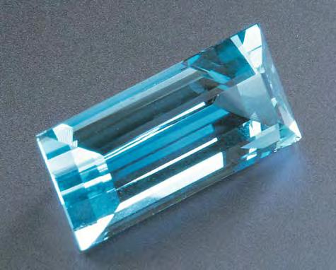 Figure 7. The crystal from which this 20.48 ct aquamarine was cut was mined in southern Madagascar. Stone courtesy of Allerton Cushman & Co.; photo by Maha DeMaggio. Madagascar. The specimen measured 15.