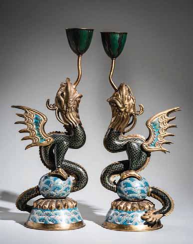 35 A PAIR OF CLOISONNÉ CANDLESTICKS IN THE FORM OF DRAGON FISH Cloisonné enamel. China, Qing dynasty A fine pair of cloisonne candlesticks in the form of winged dragon fish.