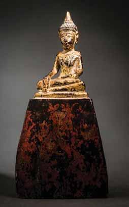 3 CM Condition: Signs of age and damaged base Provenance: From a German private 180 A BURMESE, MANDALAY STYLE, WOOD FIGURE OF A WORSHIPPER Wood, lacquer, gilding and inlays.