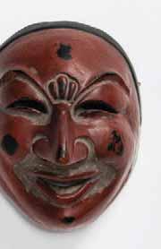 Japan, 19 th early 20 th Dry Lacquered mask, painted in red and black pigments. Signed on the back Dimensions: HEIGHT 21.7 CM, WIDTH 16.