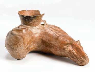 293 STANDING FEMALE FIGURE Terracotta. Pre-classical, Mesoamerica, ca. 300 BCE 290 GAME BOARD WITH JAGUARS Terracotta. Moche culture, Peru, approx.