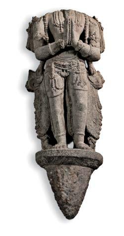 9 Andagu Stone Stele, Burma, Pagan style, with a four-armed Vishnu standing in the frontal samapada posture, holding his four attributes: a large club, a wheel of the law, a rosary, and a conch,
