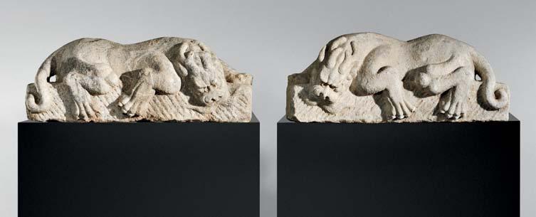 16 17 16 Pair of White Marble Lions with Dragon Heads, Ba Xia, China, possibly Tang dynasty, legendarily known as one of the nine sons of dragon king, depicted reclined on a rectangular base with one