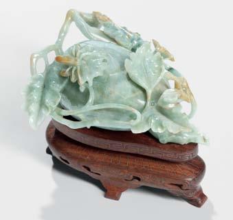 206 209 212 209 Jadeite Covered Water Coupe, China, early 20th century, carved in the form of a gourd surrounded by openwork tendrils and leaves, the cover with a leaf and an aquatic insect, celadon