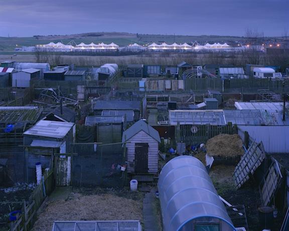 CASE STUDY: AMBER COLLECTIVE 3 underlying continuity is remarkable. A 2005 photograph by Simon Norfolk shows Dalton Park Shopping Outlet at dusk.