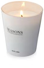 Exclusive scented candle in a glass jar with a light fragrance.