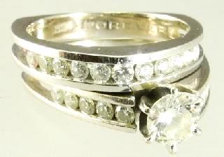 $2,500 - $3,000 457 14K White & Yellow Gold Diamond ring.