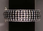 Includes 84 ALEXANDRITE AND DIAMOND BRACELET - A 14K white gold bracelet with five round faceted alexandrites (1.