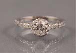 00 38 DIAMOND RING - A 14K white gold ring with one old-cut diamond (0.