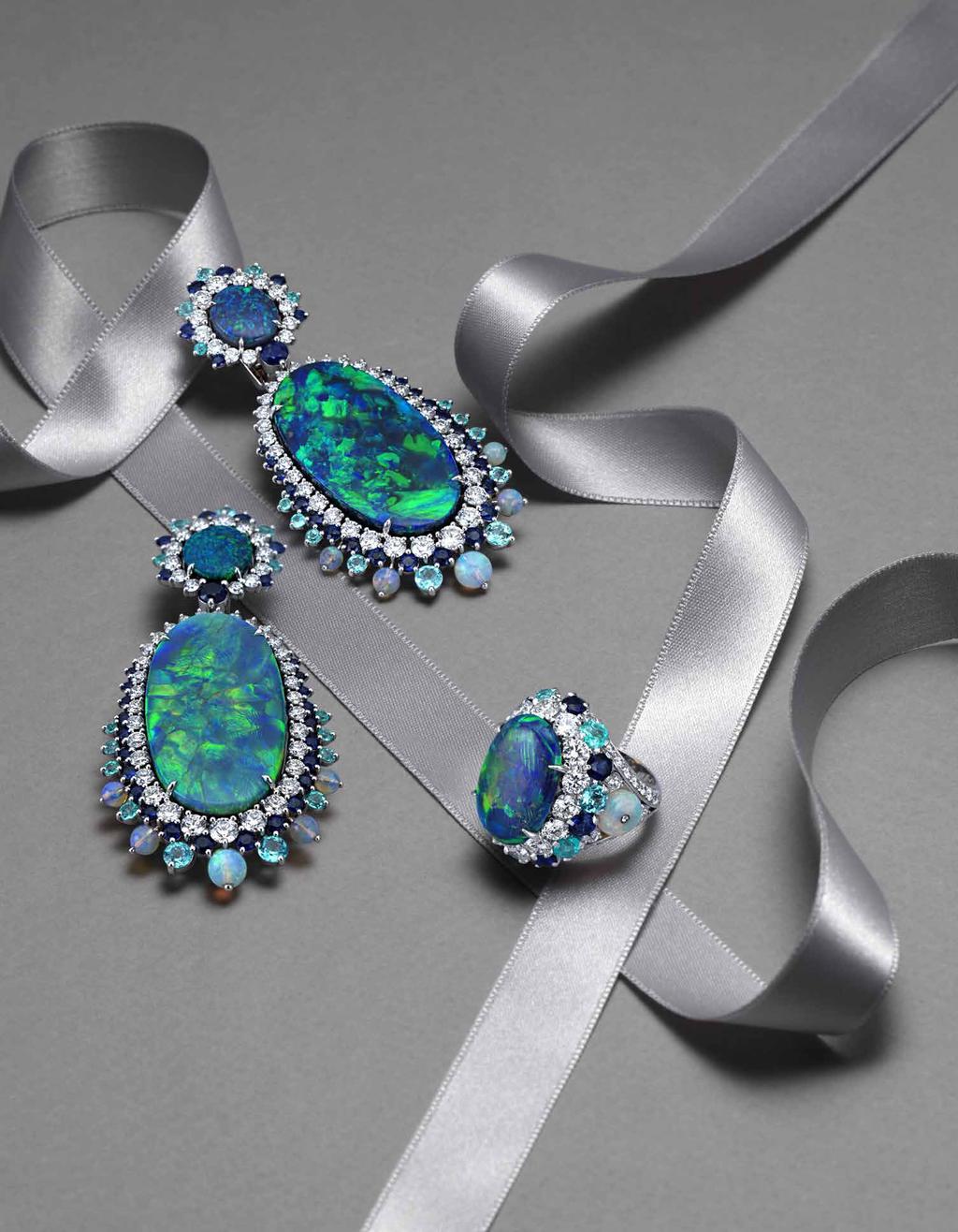 Important 18K white gold Set composed of earrings with 74.14 carats of black opals, blue sapphires, Paraiba tourmalines and white diamonds; and of a ring with an incredibly rare 16.