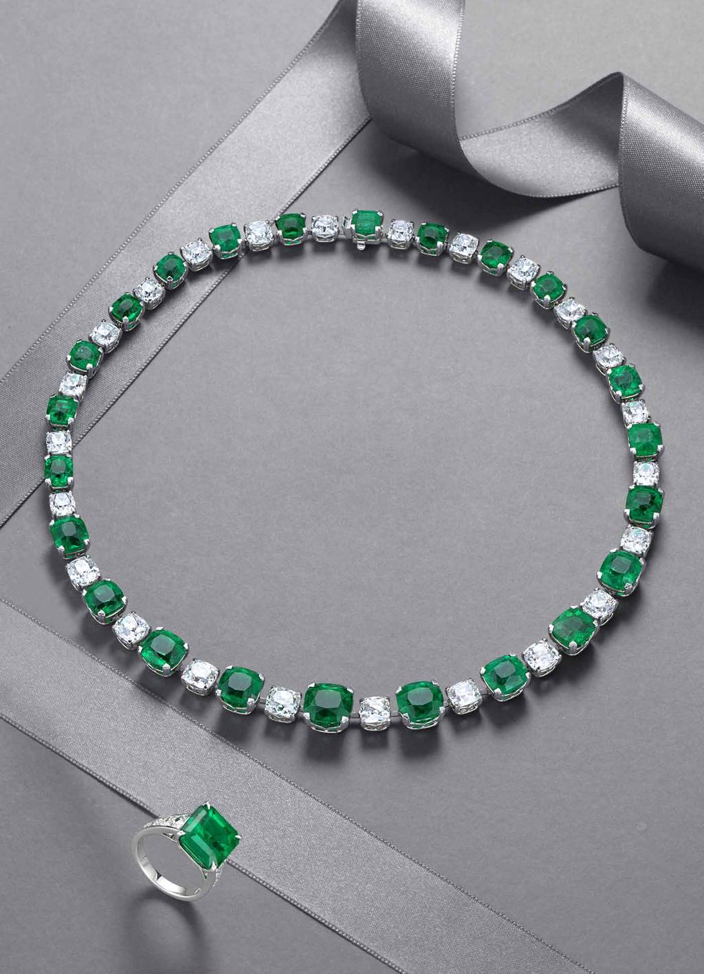 One Of A Kind Colombian Emerald And White Diamond Cushion Cut Necklace set in platinum with accompanying ring made of a Natural Colombian emerald mounted with pear-shape diamond shoulders &