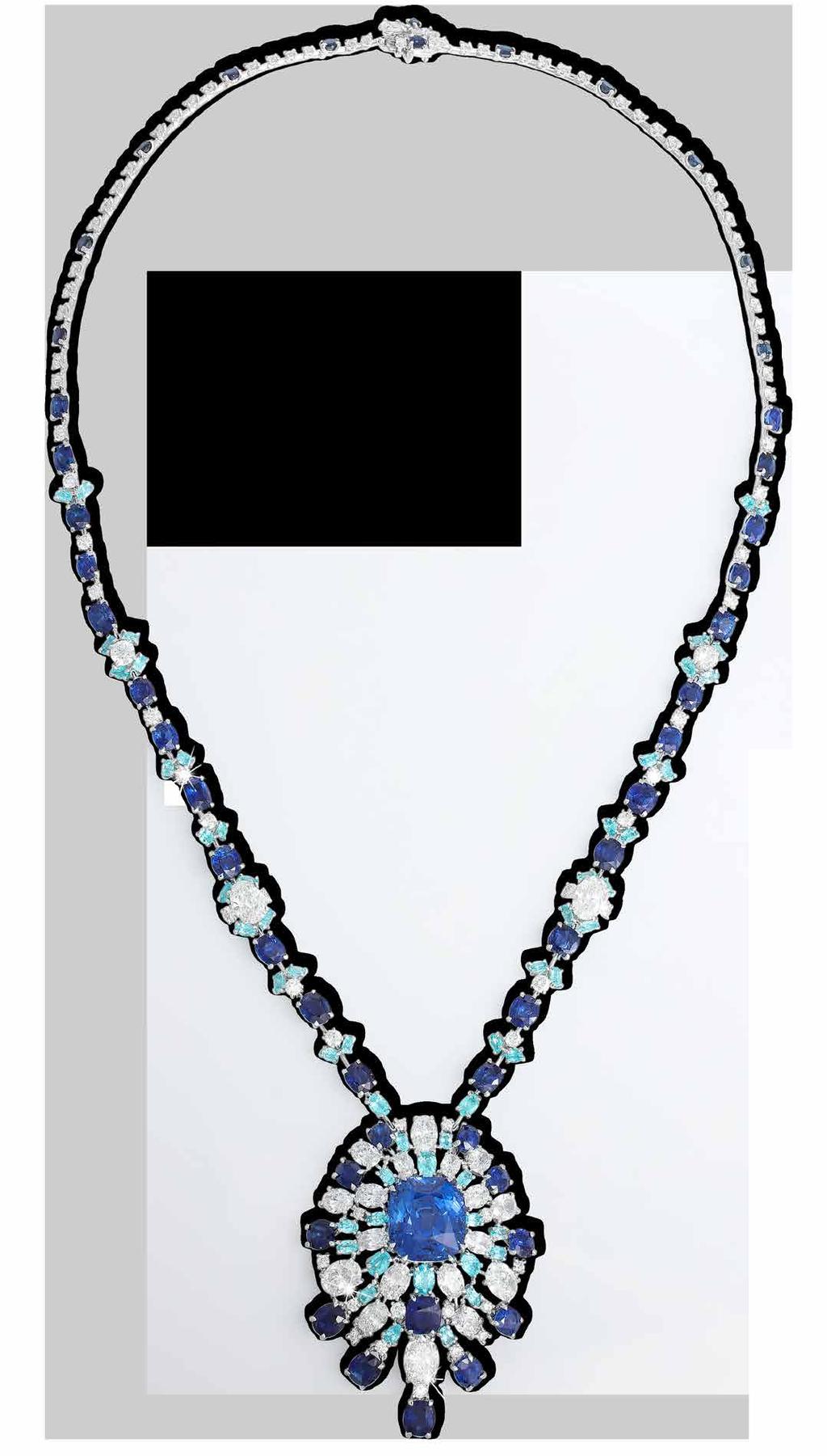 Exceptional Burma Blue Sapphire, Paraiba Tourmaline And White Diamond Necklace in 18K gold and featuring a 53-carat cushion-cut sapphire. POA.