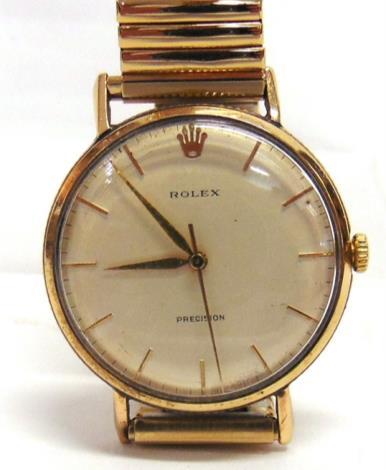 10 ROLEX PRECISION a lady's 14 carat white gold mechanical bracelet watch, London 1973, the rounded rectangular 'shot silk' white dial with black steel batons, black hands, the two piece case to an