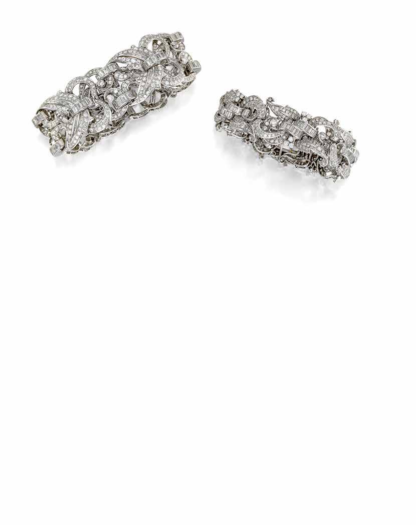 1 2 1 A DIAMOND BRACELET composed of openwork panels of foliate design, set throughout with single-cut and old mine-cut diamonds, joined by narrow oblong links set with baguette-cut diamonds;